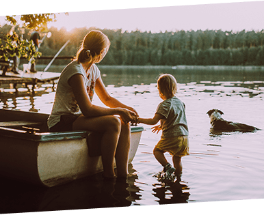 Mother with son at lake